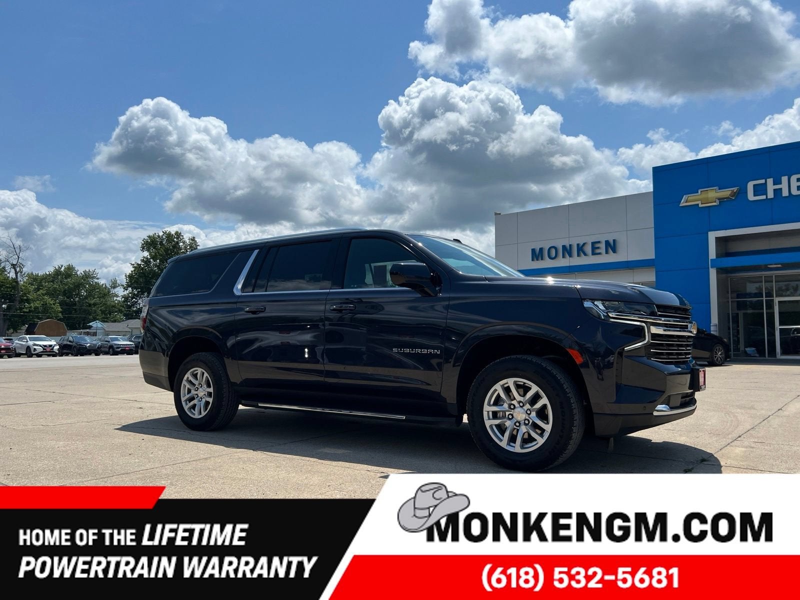 2024 Chevrolet Suburban LT in Dark Ash Metallic — front three-quarter view