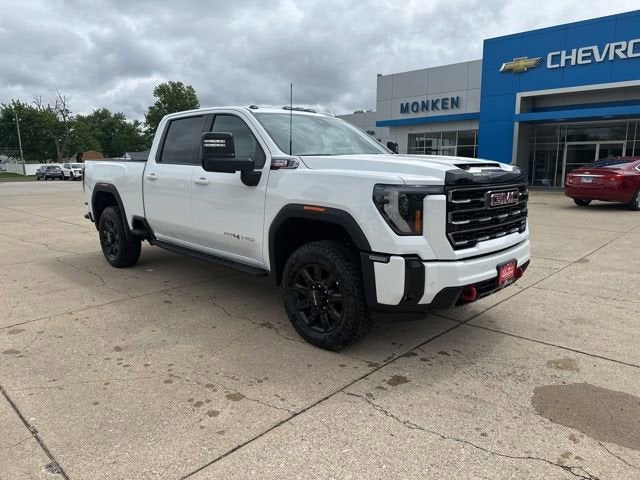 2026 GMC Sierra 2500 HD AT4 in Summit White — front three-quarter view