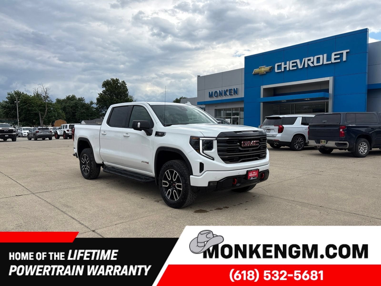 2026 GMC Sierra 1500 AT4 in Summit White — front three-quarter view