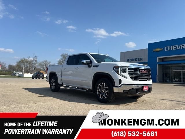 2026 GMC Sierra 1500 SLT in Summit White — front three-quarter view