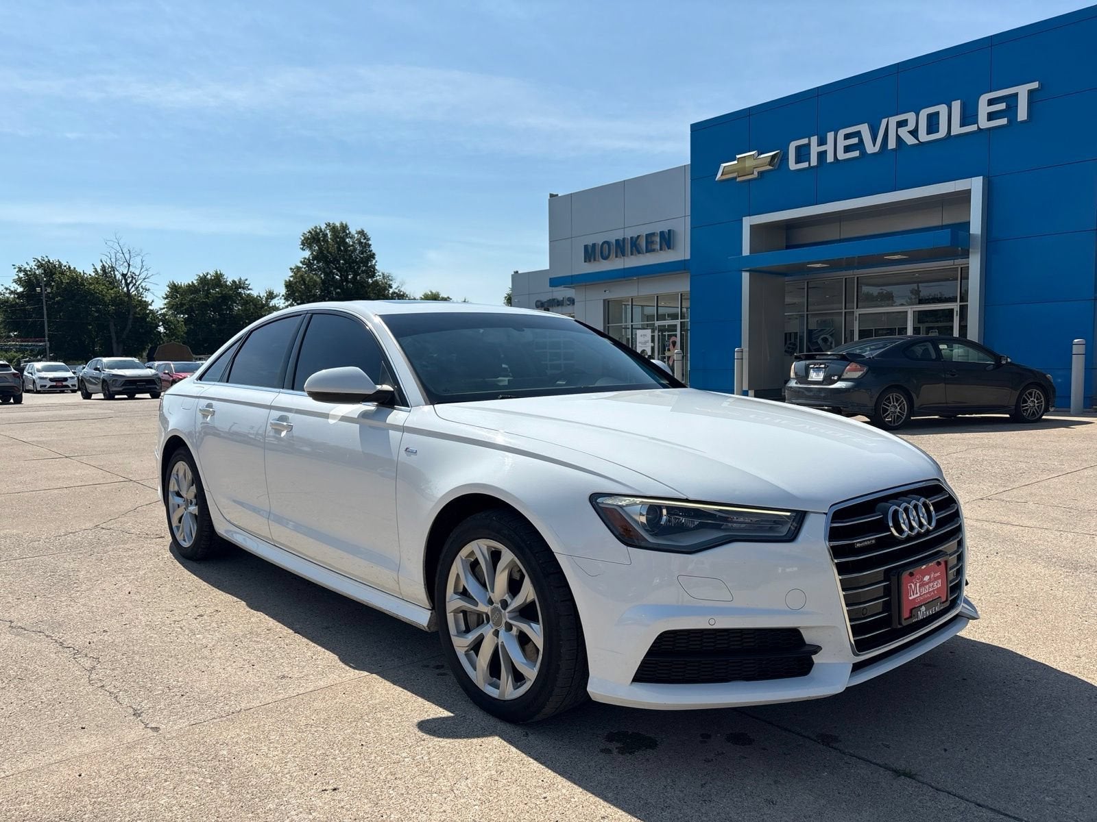 2018 Audi A6 Premium in White — front three-quarter view